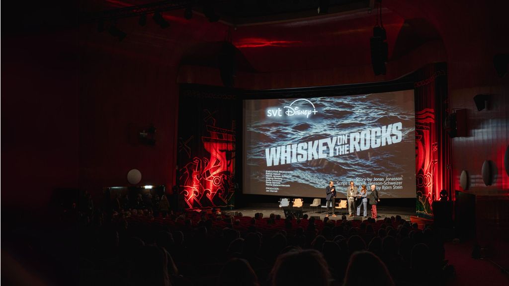 People presenting a project on stage